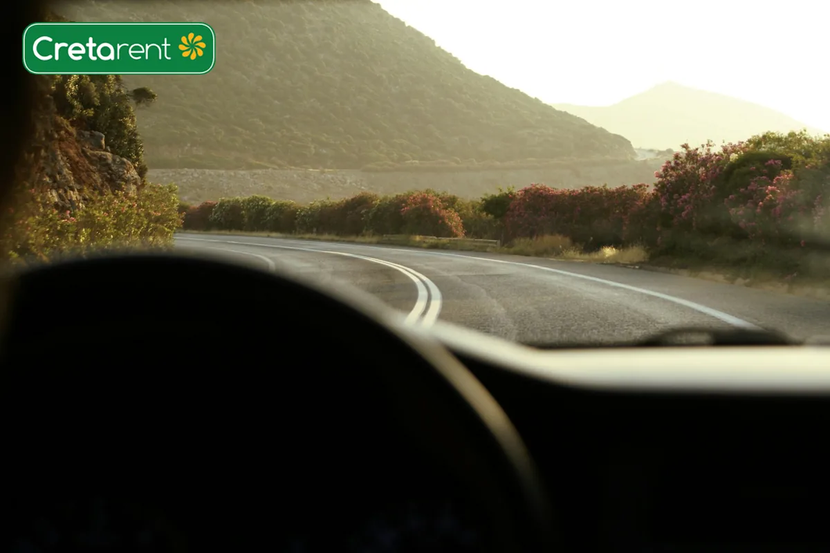 View through a car windscreen of a road near Heraklion, Crete